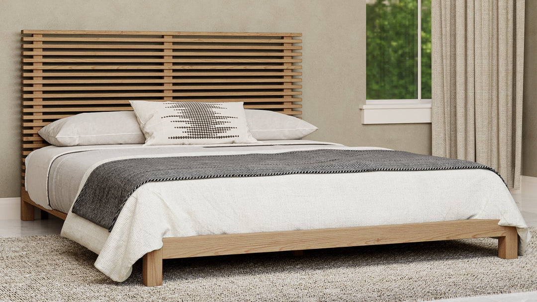 Tanner Japandi bed van essenhout in rustige Scandinavische slaapkamer