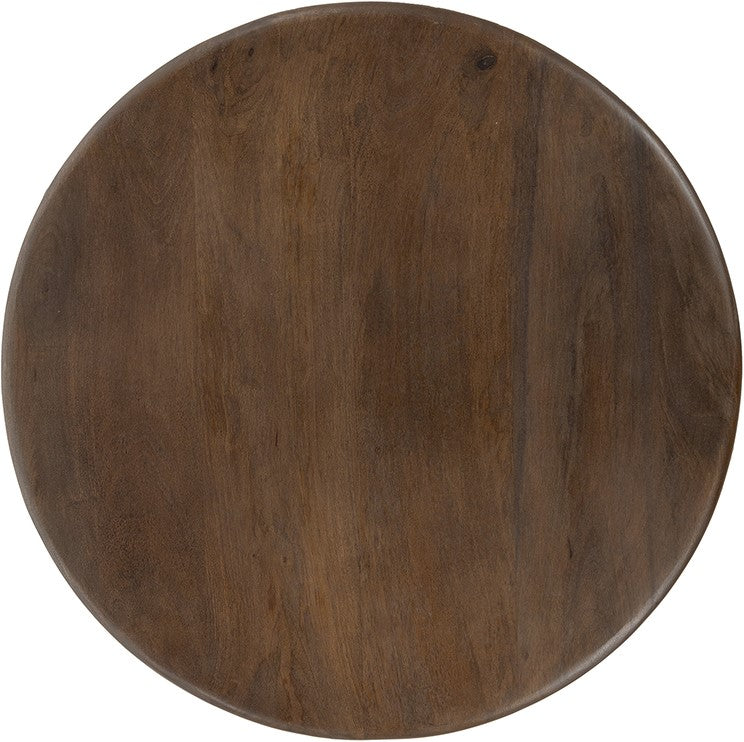 Detail van het ronde tafelblad van mango hout met warme walnootkleurige afwerking en natuurlijke houtstructuur.