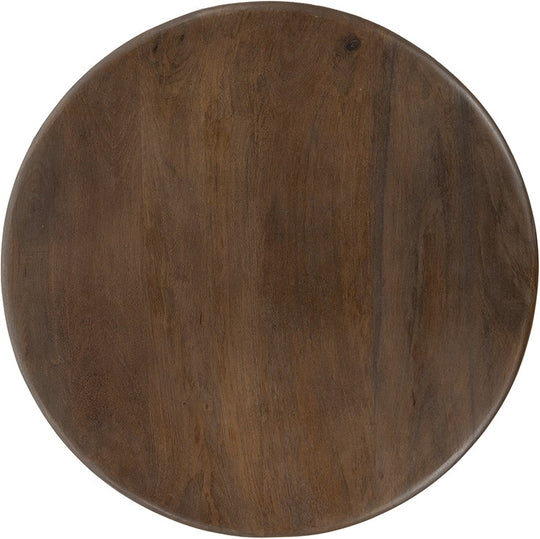 Detail van het ronde tafelblad van mango hout met warme walnootkleurige afwerking en natuurlijke houtstructuur.